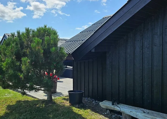 House In Nature By The Water At Lango